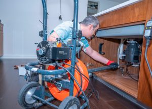 Licensed plumbing contractor tackles a clogged kitchen drain in St. Petersburg, FL.